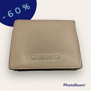 Michael Kors Mercer card case, pebbled leather with silver-tone metal hardware.